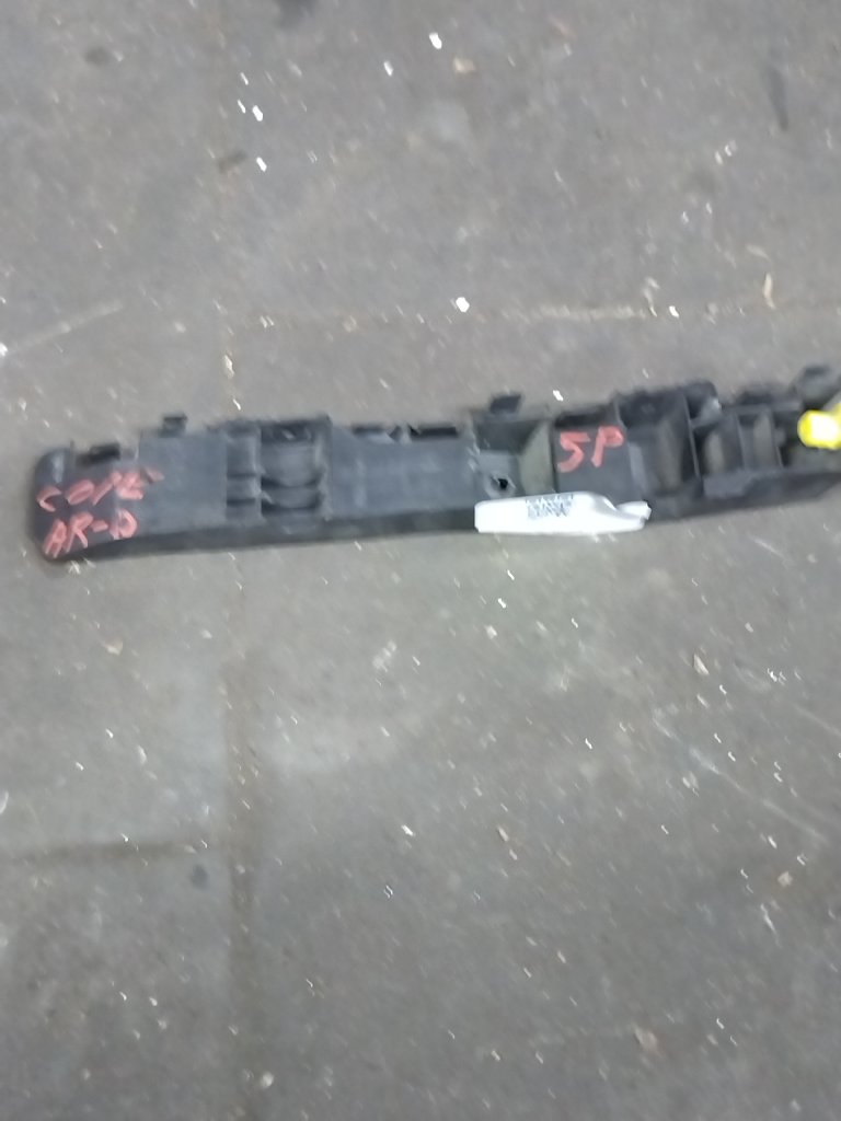 Rear bumper plastic support