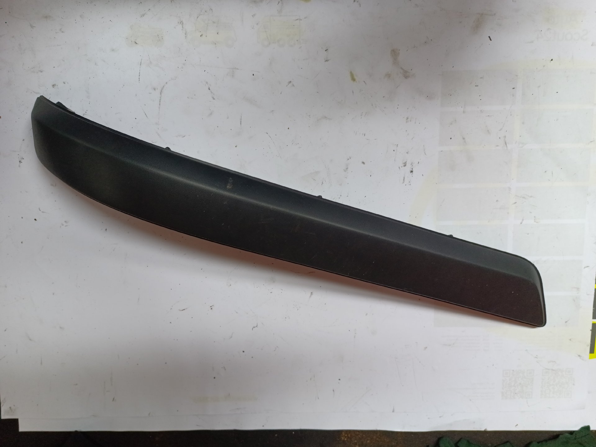 Left rear bumper trim strip