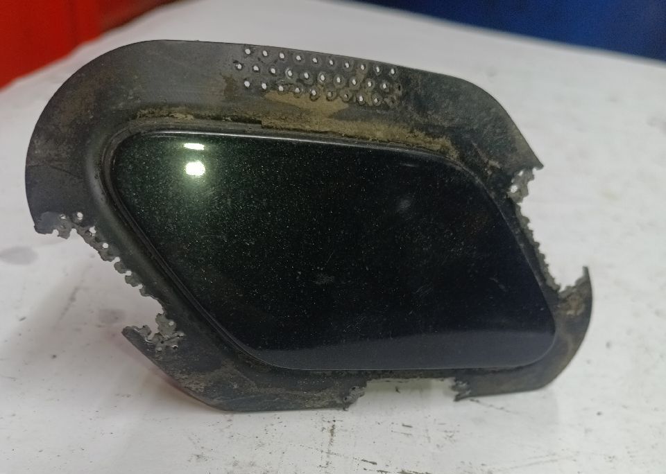 Right front windshield washer nozzle