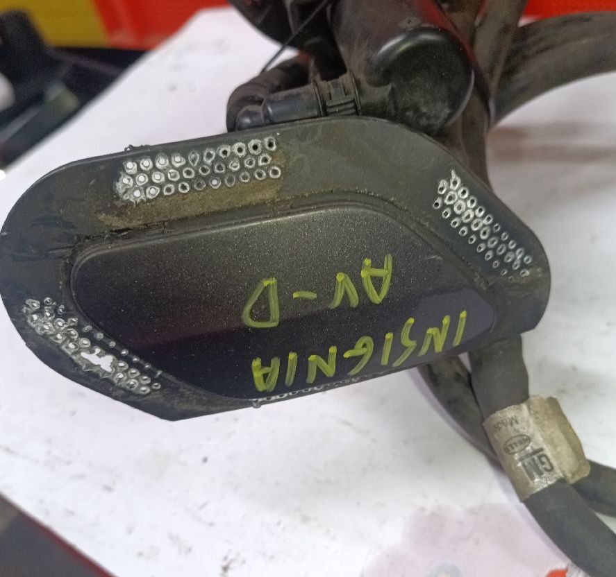 Headlight washer nozzle assembly with hose