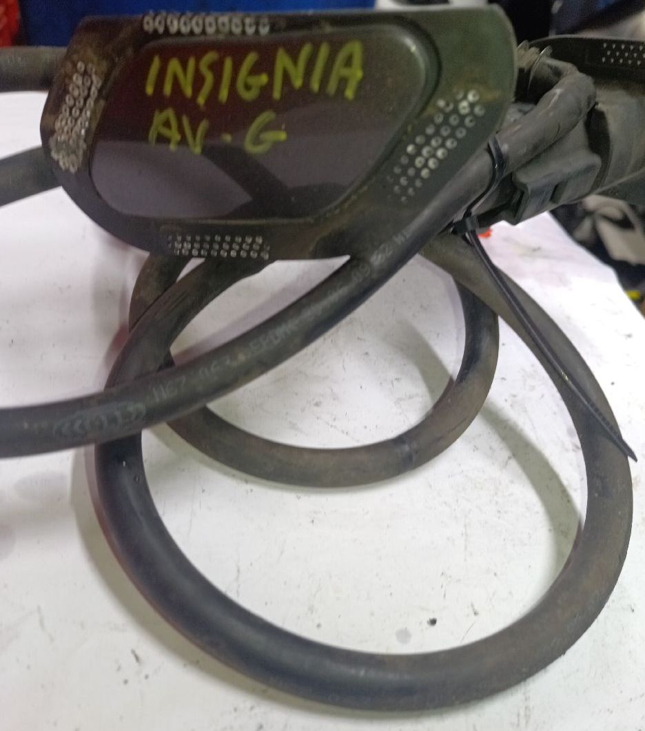 Headlight washer nozzle assembly with hose
