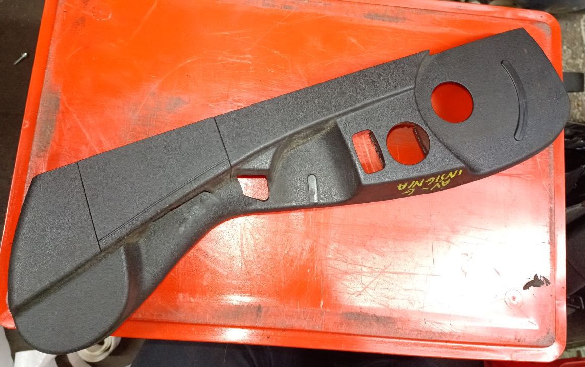 Front passenger seat rail trim