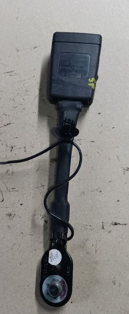 Front left seat belt pretensioner