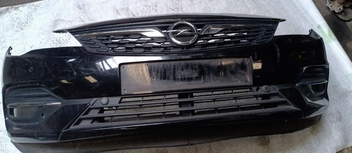 Front bumper for Astra K with 4 parking sensors, black