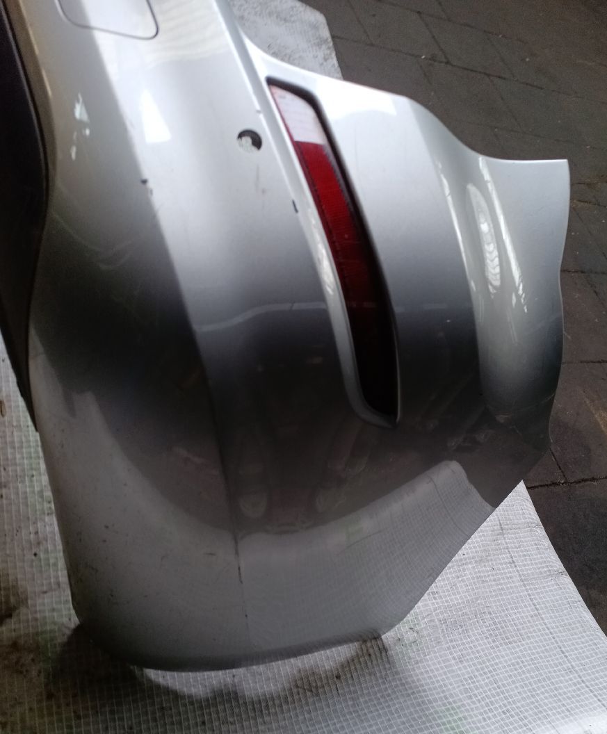 Achterbumper Astra J stationwagen grijs met 4 parkeersensoren