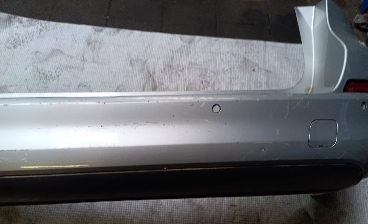 Achterbumper Astra J stationwagen grijs met 4 parkeersensoren