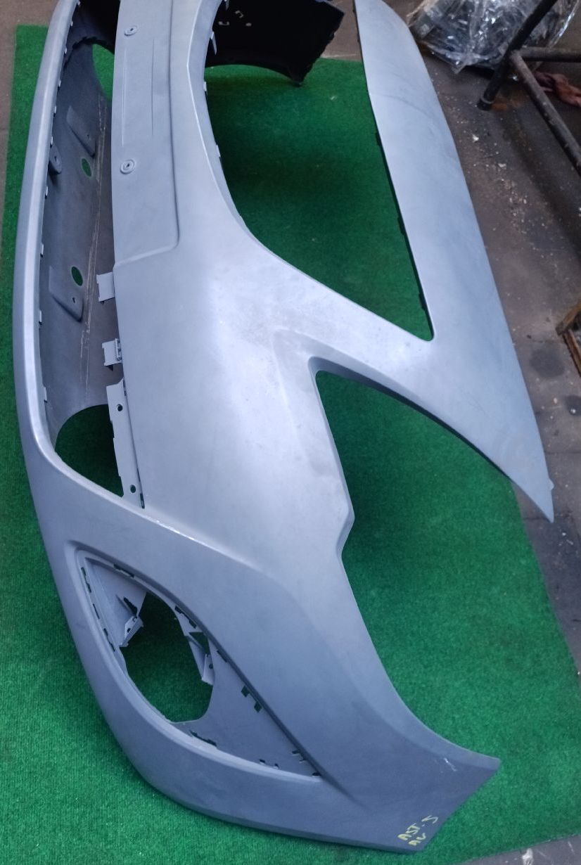Front bumper, unpainted, without sensors