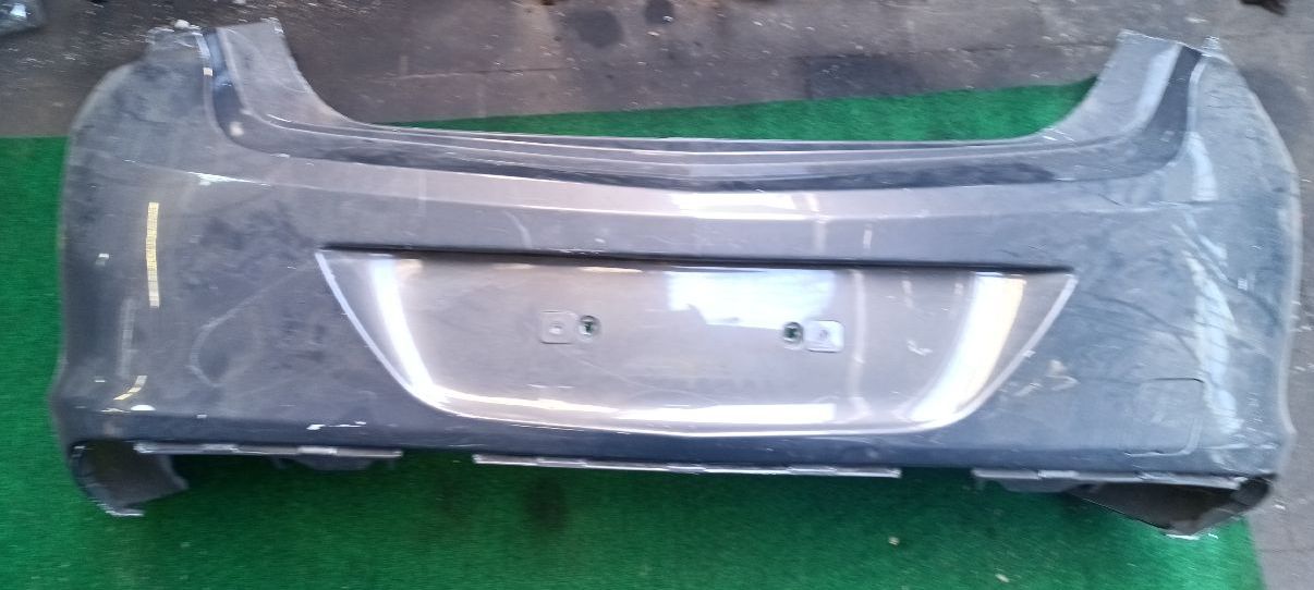 Achterbumper Astra J 4‑deurs