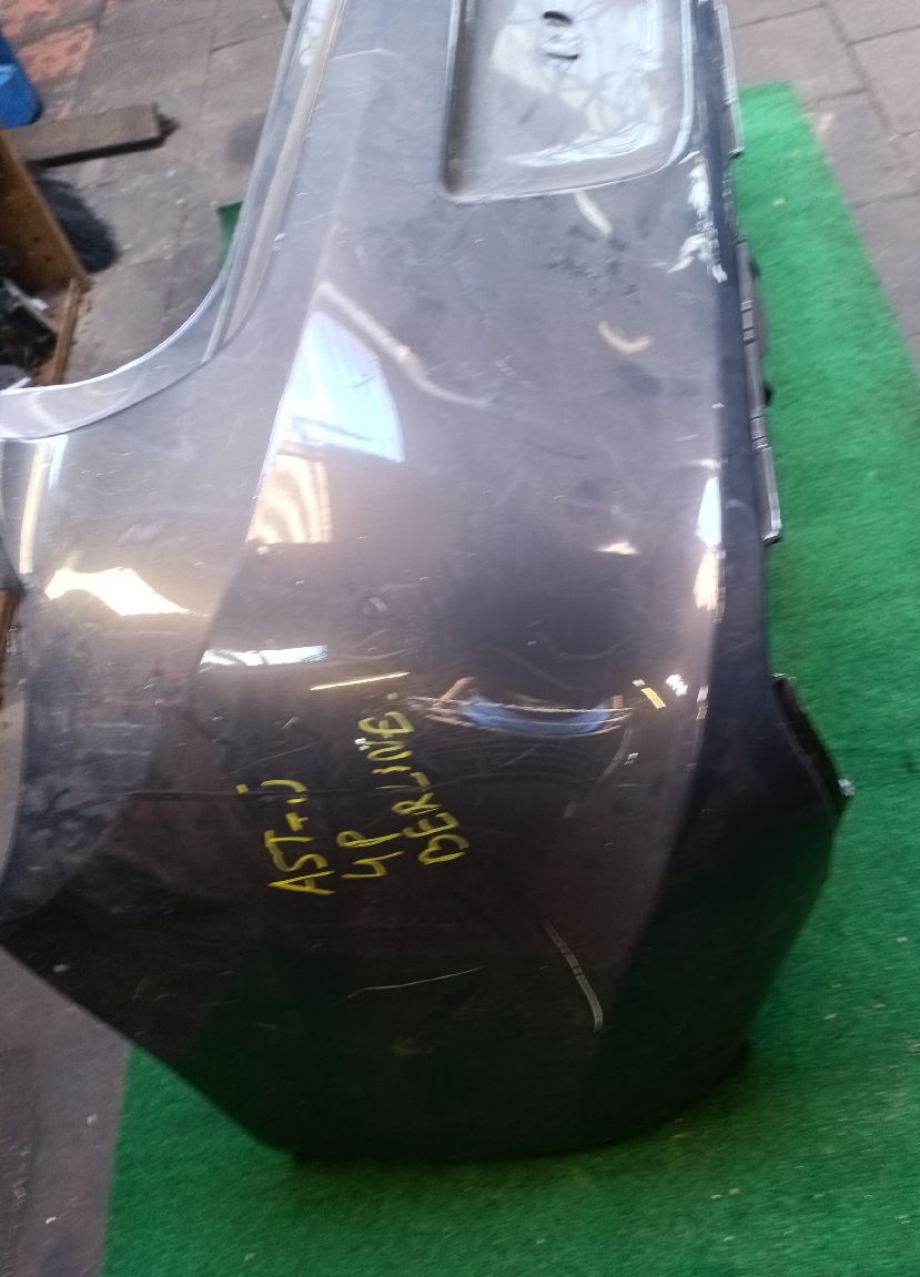 Achterbumper Astra J 4‑deurs