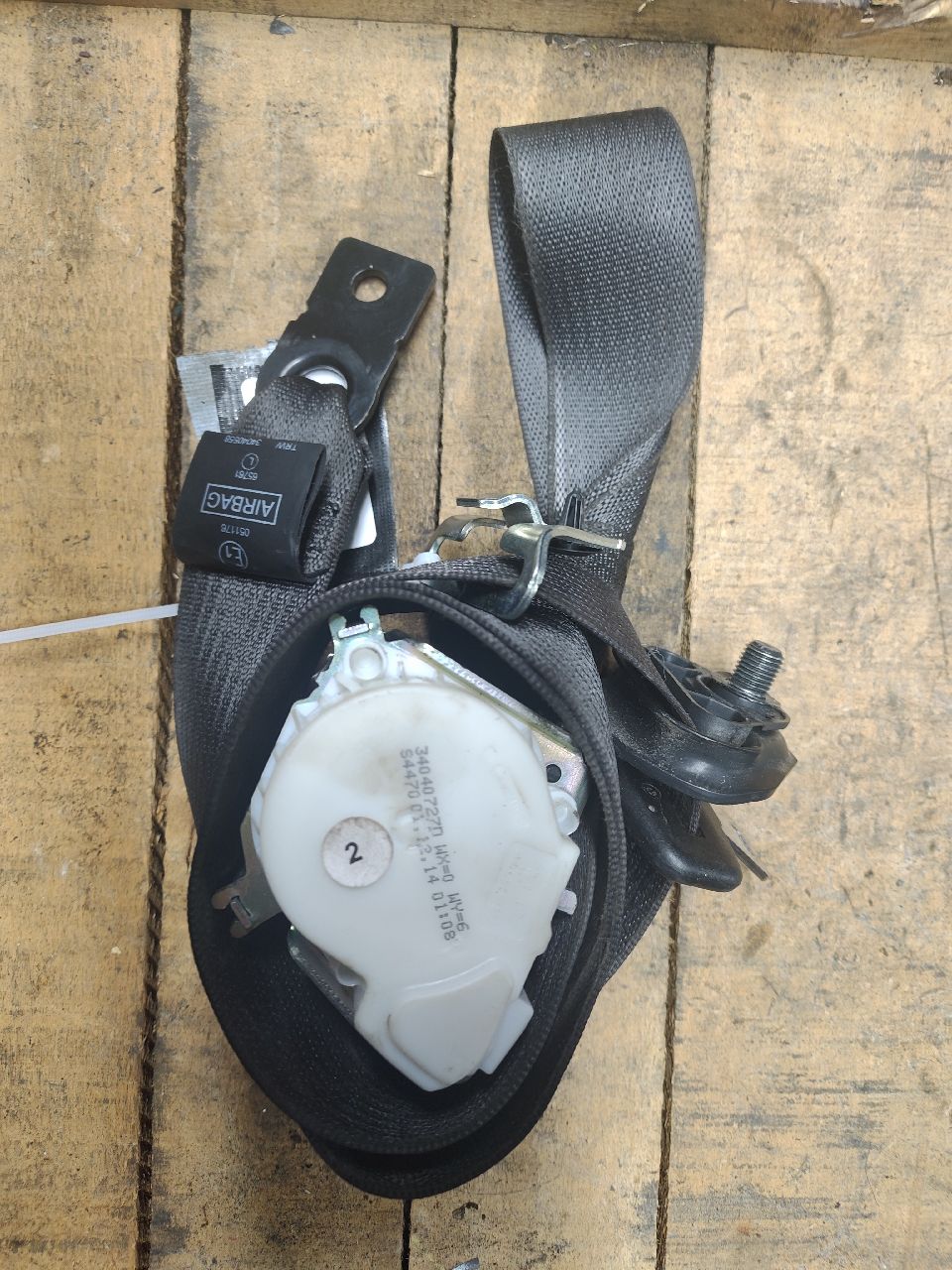 Front left seat belt retractor