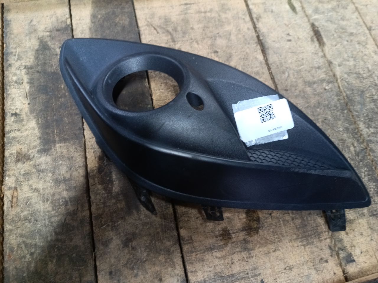 Front left fog light plastic bezel