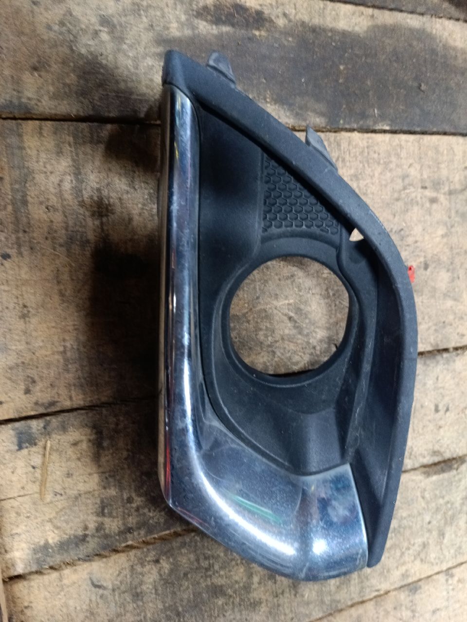 Right front fog light bezel (plastic)