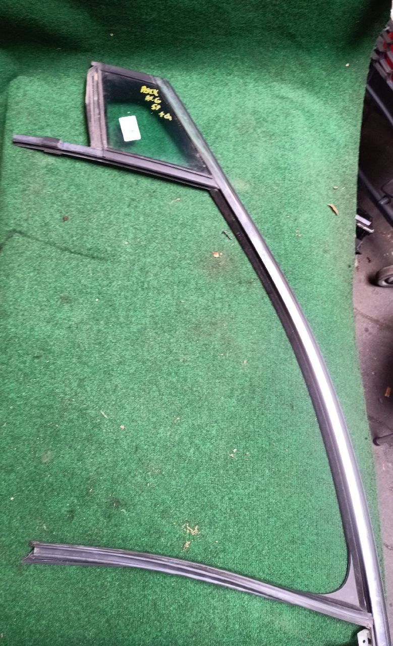 Front left glass with chrome trim