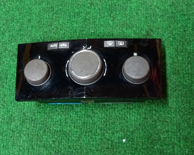 Black climate control knob