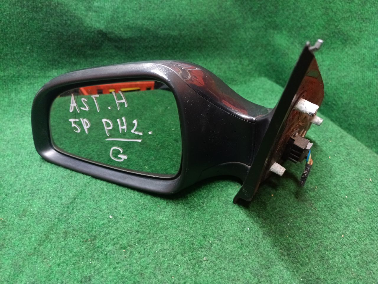 Left electric heated exterior mirror